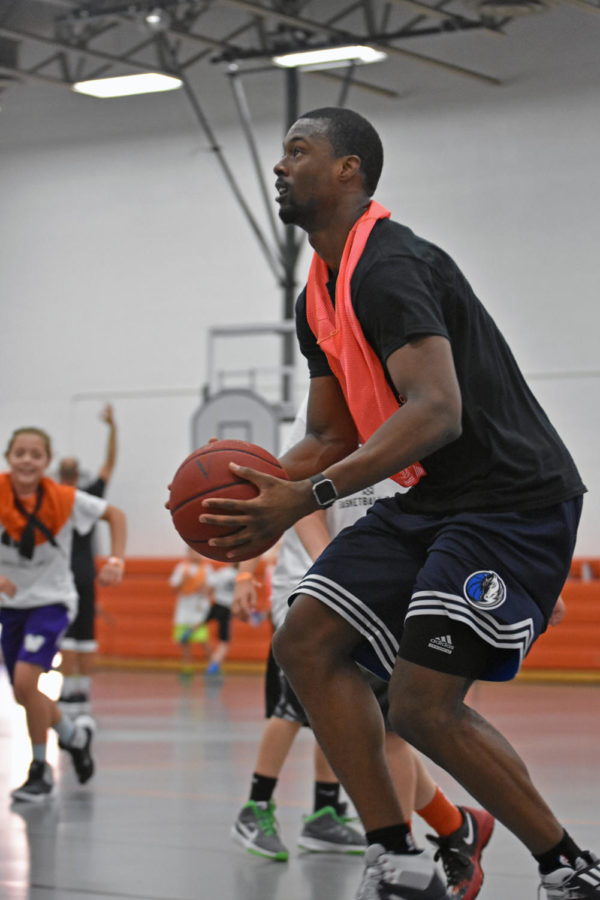 Harrison Barnes prepares to shoot during the Harrison Barnes Basketball Camp on July 8. The Ames native signed with the Dallas Mavericks on July 6.