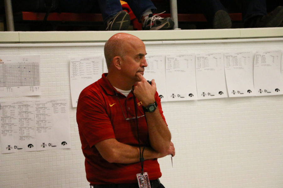 Iowa State Head Coach Duane Sorenson watches his swimmers. The Iowa State swim team hosted the annual Cy-Hawk swim meet at Beyer Hall on Dec. 11, 2015. The Hawkeyes would go on to win every event, contributing to the teams 190-93 win. 