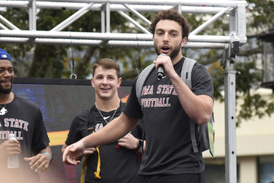 Then-junior+defensive+back+Greg+Eisworth+spoke+to+the+fans+and+lead+them+in+singing+Happy+Birthday+to+quarterback+Brock+Purdy+at+the+Camping+World+Bowl+fan+pep+rally.