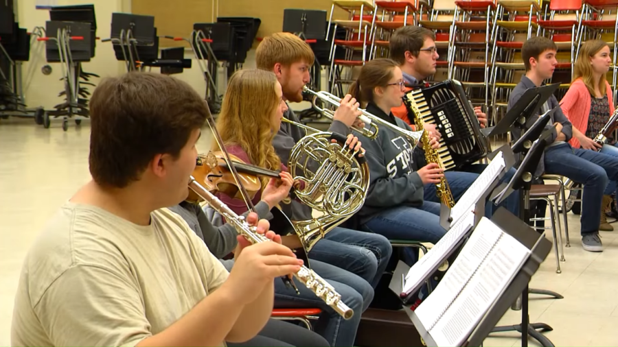 String and percussion players at Iowa State University are now required to wear facial masks while winds and brass players must practice social distancing.