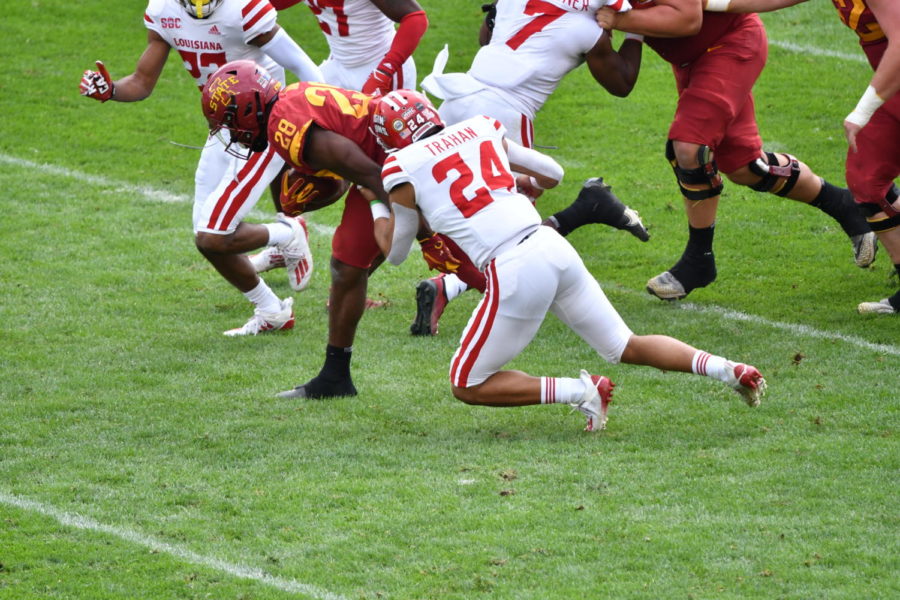 Iowa State running back Breece Hall is tackled by Louisianas Bralen Trahan during the first half of the game Sept. 12. Hall ended his day with 103 yards rushing, a touchdown and a fumble.