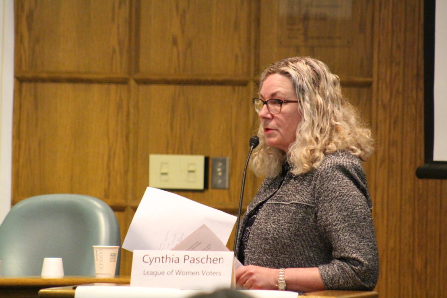 Cynthia Paschen moderating a forum March 30, 2019, at Ames City Hall. 