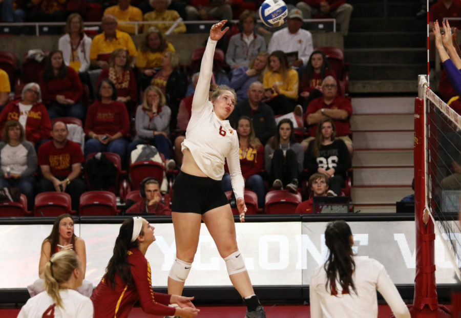 Right+side+hitter+Eleanor+Holthaus+jumps+to+hit+the+ball+toward+Kansas+State+during+the+game+Oct.+26%2C+2018%2C+at+Hilton+Coliseum.+Holthaus+led+Iowa+State+in+kills+during+the+2019+season+opener+with+12.