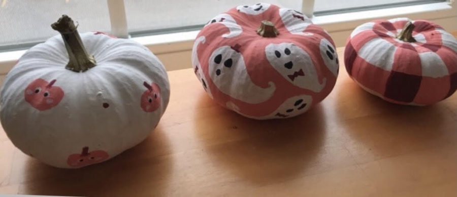 Painting mini pumpkins is a creative way to decorate this fall.