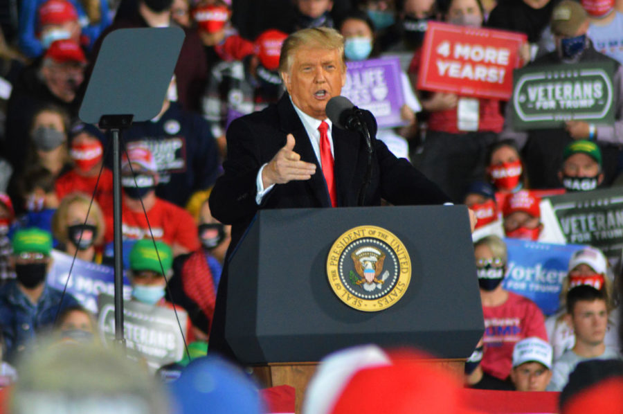 President Donald Trump speaks to thousands of supporters at a rally Oct. 14 at the Des Moines International Airport.