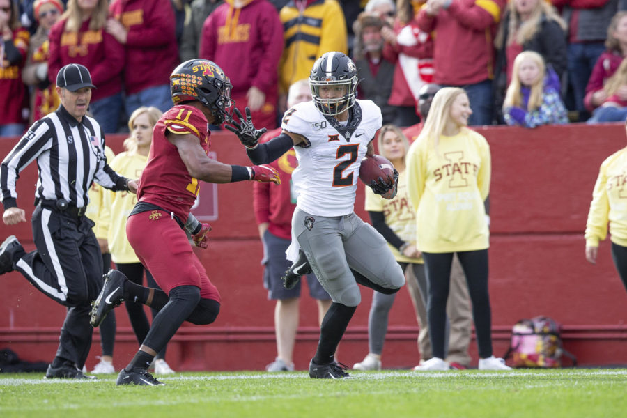 Oklahoma State wide receiver Tylan Wallace runs up the field against Iowa State on Oct 26, 2019. Wallace had 131 yards and a touchdown in a 34-27 win for the Cowboys.