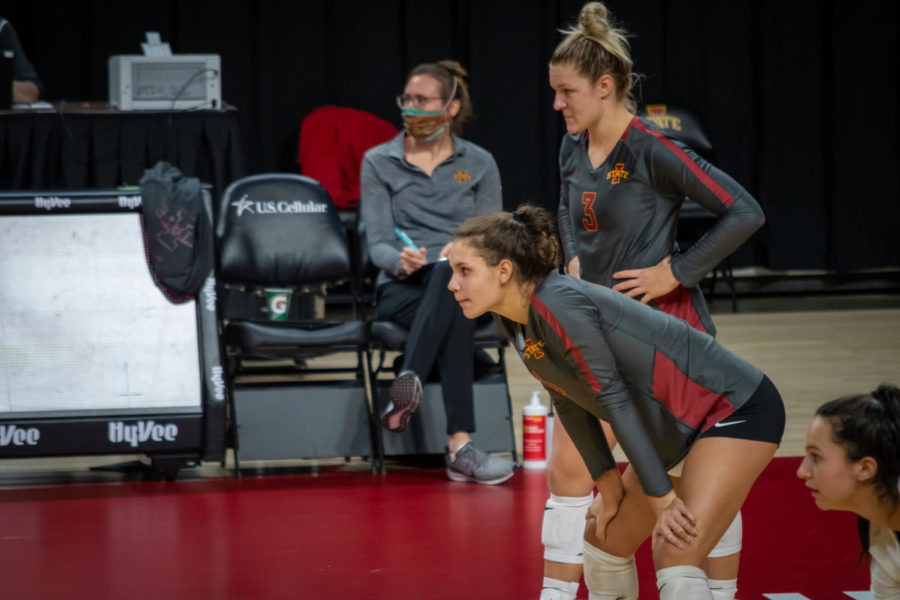 Brooke Andersen (front) and Jenna Brandt (back) pause for a breath against Texas Tech on Oct. 3. Iowa State lost 3-2 in the second game of the doubleheader against Texas Tech.
