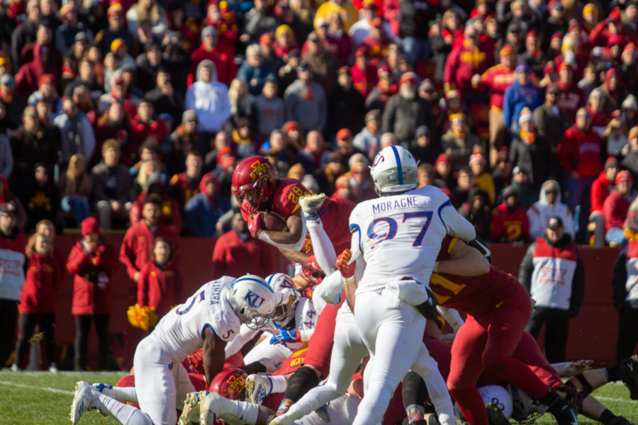 Then-freshman running back Breece Hall jumps over the entire offensive and defensive line for another of Iowa States touchdowns against University of Kansas. Iowa State won 41-31 on Nov. 23.