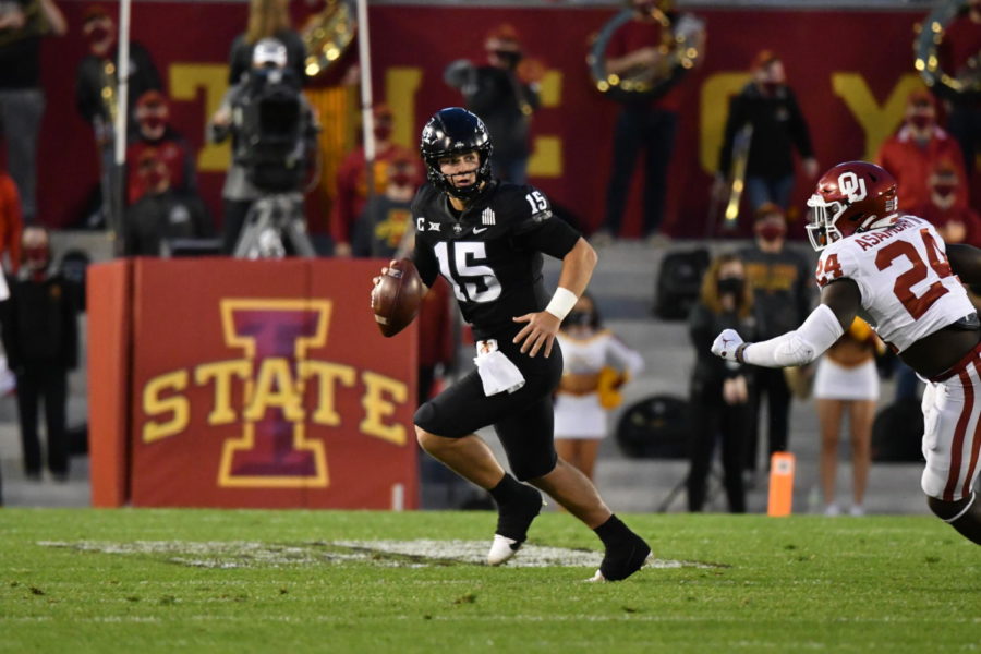 Iowa State quarterback Brock Purdy rolls out of the pocket to avoid an Oklahoma defender during the game against the Sooners on Oct. 3, 2020 at Jack Trice Stadium.