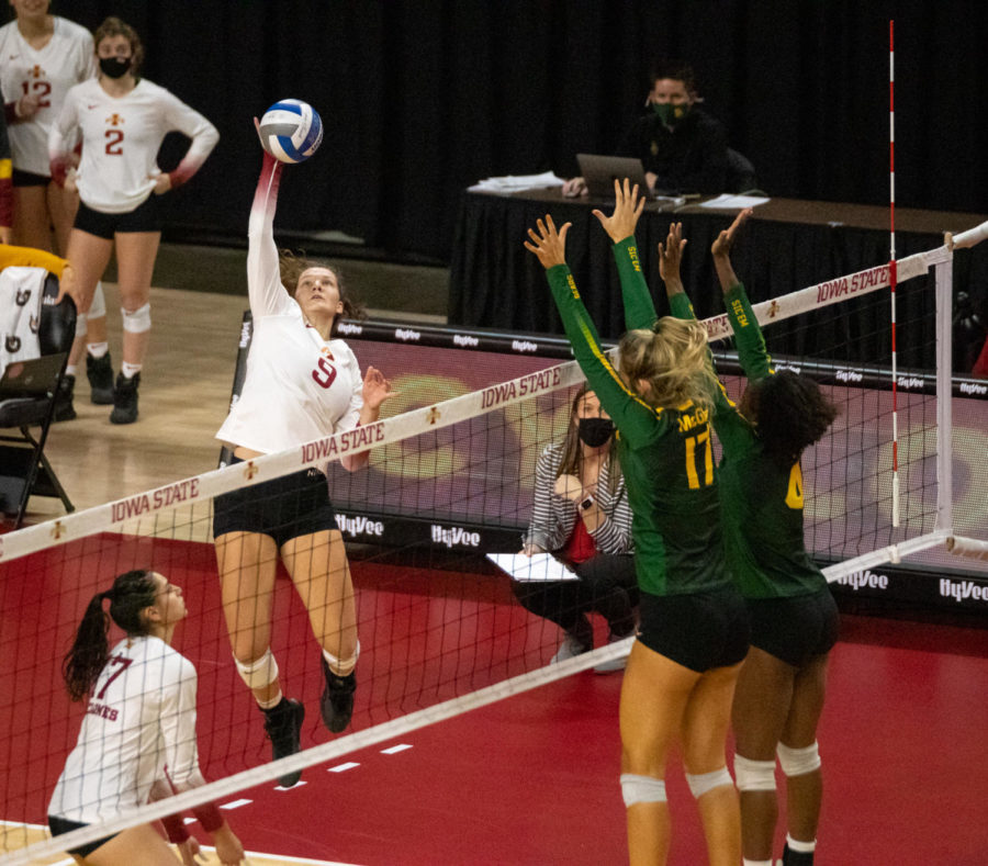 Sophomore outside hitter Annie Hatch goes for a kill against Baylor on Friday night.