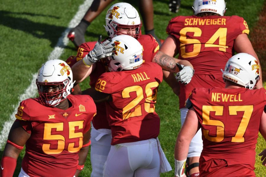 Iowa State sophomore running back Breece Hall celebrates with redshirt senior offensive lineman Sean Foster in the game against Texas Tech on Oct. 10.