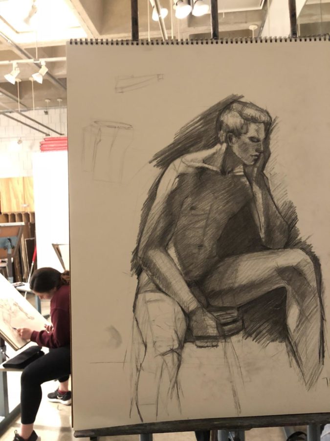 Holding poses is harder than it looks. Lucas Fisher poses for figure drawing class. 