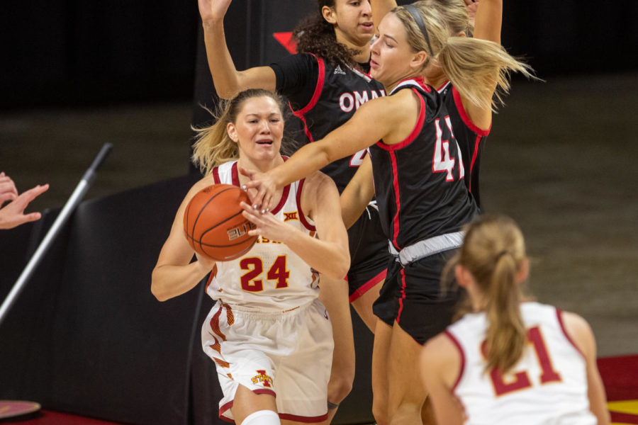 Iowa State junior guard Ashley Joens fights for a rebound against Omaha in the 2020-21 season opener Nov. 25 at Hilton Coliseum in Ames, Iowa.
