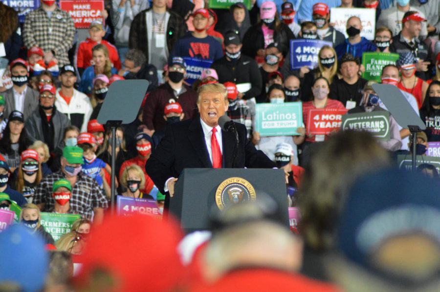 President Donald Trump speaks to thousands of supporters at a rally Oct. 14 at the Des Moines International Airport.
