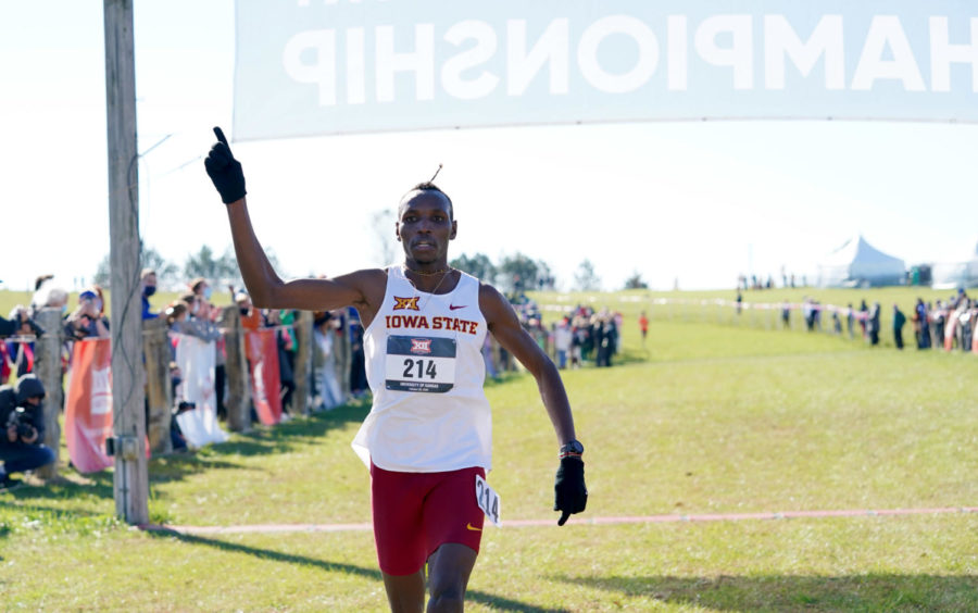 Wesley+Kiptoo+celebrates+as+he+crosses+the+finish+line+and+wins+the+individual+title+at+the+Big+12+Cross+Country+Championships+on+Oct.+30.+%28Photo+credit%3A+Denny+Medley%2FRandom+Photography%29