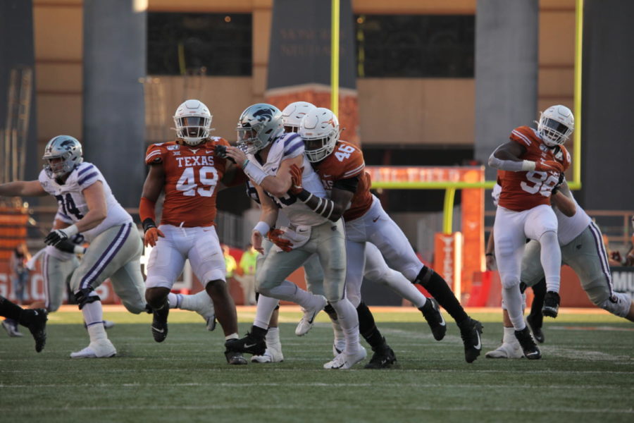 Then sophomore Texas linebacker Joseph Ossai tackles a Kansas State player on Nov 9, 2019.