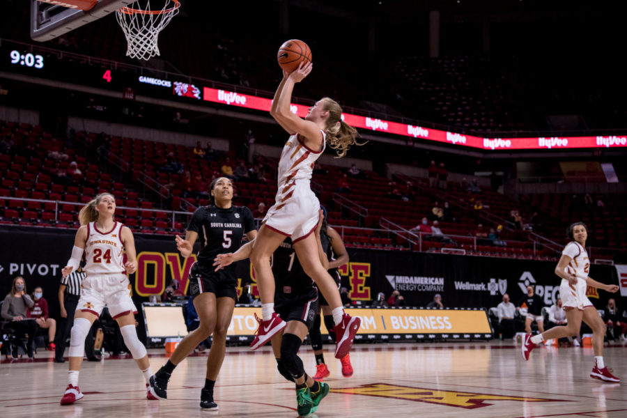 Iowa State junior Ashley Joens attacks the basket against South Carolina on Dec. 6 at Hilton Coliseum. Joens led the team in scoring with 32 points.