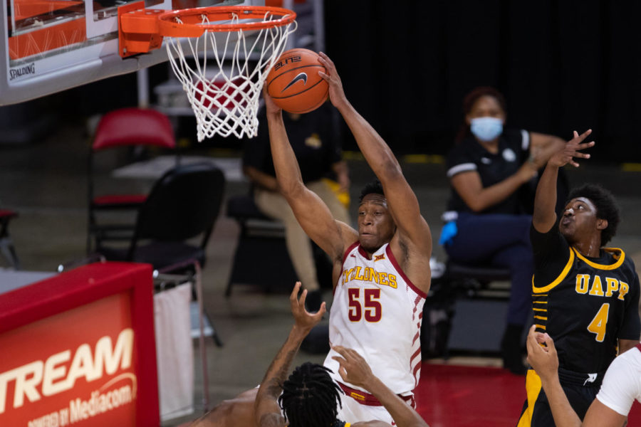 Iowa State freshman Darlinstone Dubar grabs a rebound Nov. 29 at Hilton Coliseum. Dubar ended with seven points and six offensive rebounds in his collegiate debut. 