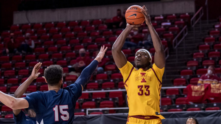 Iowa State redshirt senior forward Solomon Young prepares to shoot a shot over a Jackson State defender. Young led the Cyclones in scoring with 18 points in Iowa States 60-45 win over Jackson State.