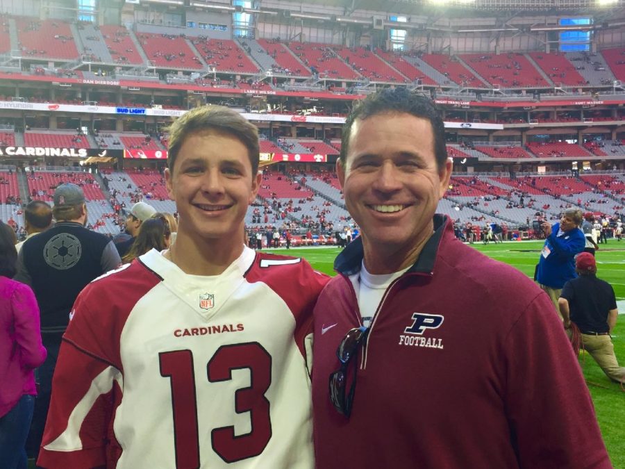 Brock Purdy (left) and his high school football coach Preston Jones (right) stand on the sideline in University of Phoenix Stadium in December 2016.
