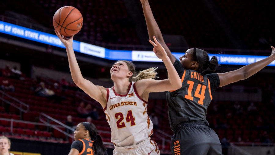 Ashley Joens goes up for a layup against Oklahoma States Taylen Collins on Jan. 13 in a 90-80 win for the Cyclones. 
