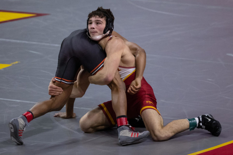 Ian+Parker+grapples+with+a+Wartburg+wrestler+at+the+Iowa+State+wrestling+meet+at+Hilton+Coliseum+in+Ames%2C+Iowa%2C+on+Jan+3.+%28Photos+courtesy+of+Wesley+Winterink%2FIowa+State+Athletics%29
