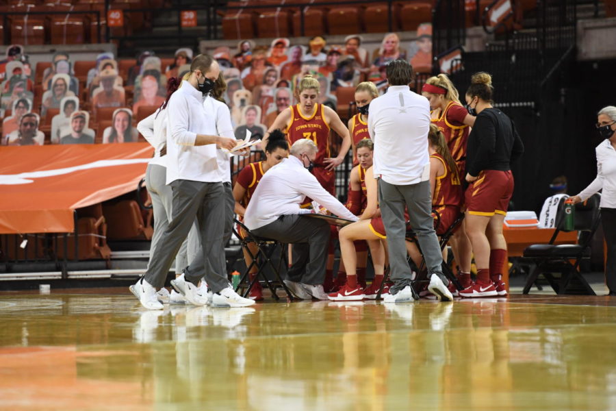 Iowa State Head Coach Bill Fennelly meets with his team in a huddle during a timeout Jan. 3 against the Texas Longhorns in Austin, Texas. 