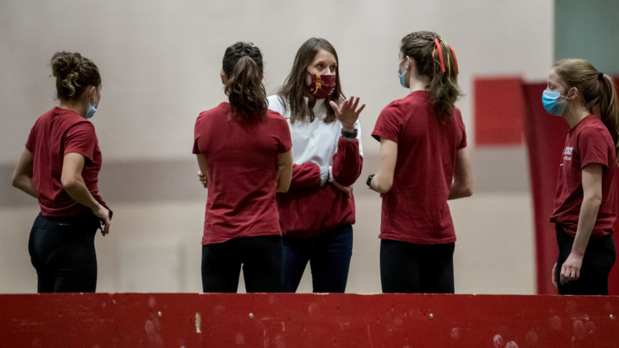 Iowa State assistant track and field coach Amy Rudolph talks with members of the Iowa State womens track and field team on Jan 23. (Photo courtesy of Luke Lu/Iowa State Athletics)