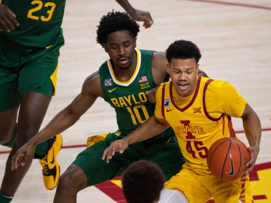 Iowa State guard Rasir Bolton moves with the basketball against Baylors Adam Flagler on Saturday in Hilton Coliseum. (Photo courtesy of Wesley Winterink)
