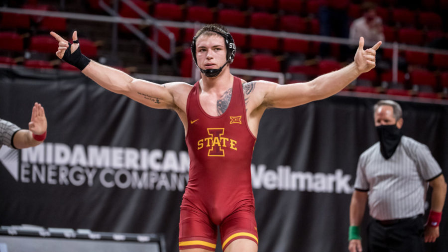 Julien Broderson celebrates his 4-1 victory over Oklahoma States Anthony Montalvo on Jan. 30 at Hilton Coliseum.