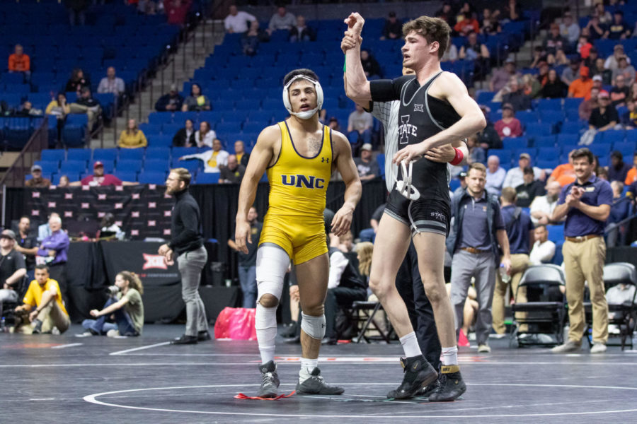 Iowa States Jarrett Degen has his armed raised after defeating Northern Colorados Andrew Alirez in their third-place match at 149 pounds March 8, 2020, at the Big 12 Championships inside the Bank of Oklahoma Center in Tulsa.