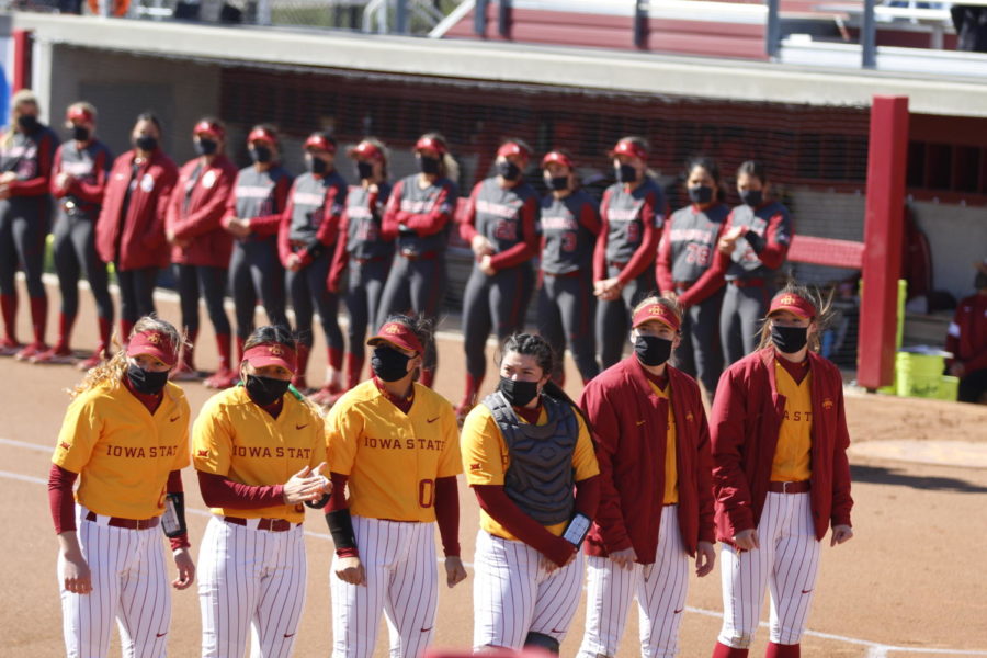 Iowa State softball players lineup pregame before their game against Oklahoma on March 28 at the Cyclone Sports Complex.