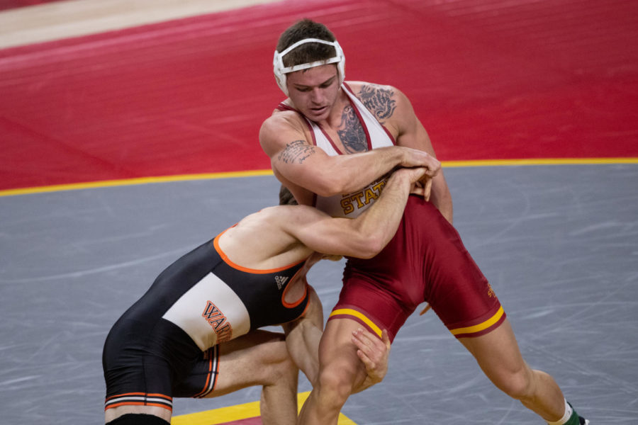 Iowa State redshirt freshman Julien Broderson wrestles against Wartburgs Kyle Briggs on Jan 3 in Hilton Coliseum. Iowa State opened the 2020-21 season with a 35-6 win. (Photo courtesy of Wesley Winterink/Iowa State Athletics)