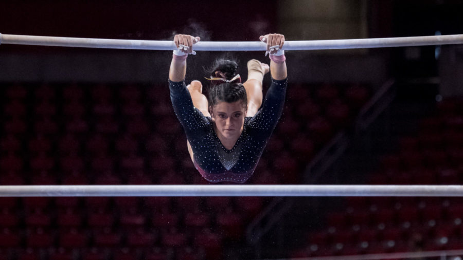 Natalie Horowitz does a routine on the uneven bars in the Iowa State gymnastics meet against Denver on Jan 15 in Hilton Coliseum. (Photo courtesy of LUKE LU/Iowa State Athletics)