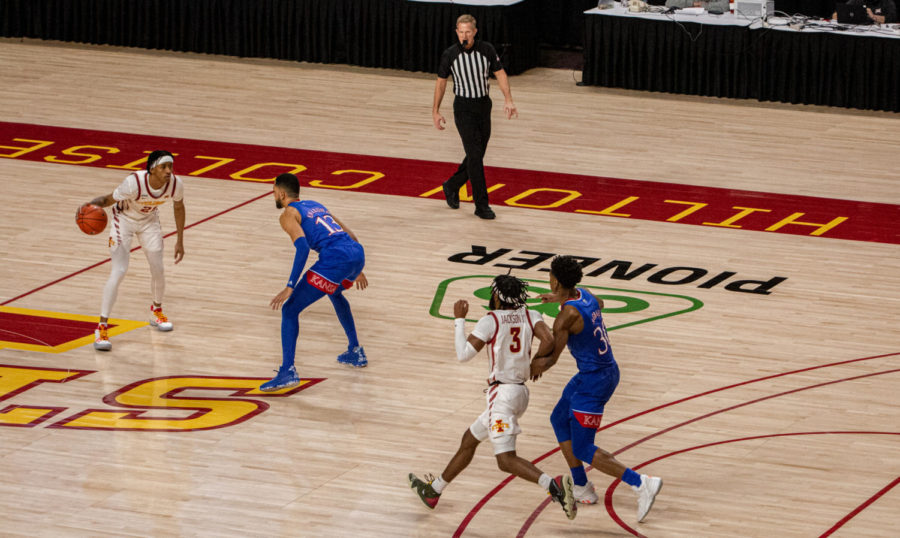 Iowa State guard Jaden Walker surveys the court against Kansas. Walker came away with 14 rebounds Feb. 13, however the Jayhawks defeated the Cyclones 64-50.