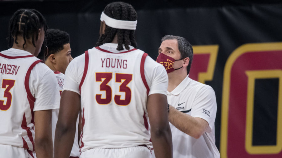 Iowa State Head Coach Steve Prohm talks to the Cyclones during a timeout against Kansas on Feb. 13.