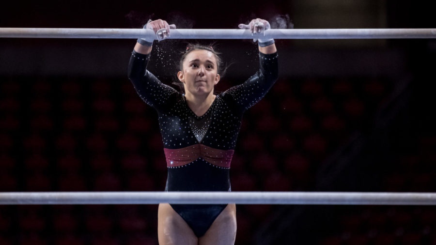 Iowa State gymnast Madelyn Langkamp performs on the uneven bars during a gymnastics meet against Denver on Jan. 15.
