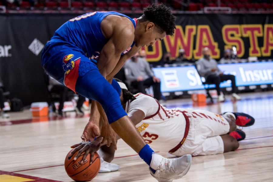 Redshirt senior forward Solomon Young dives for a loose ball against Kansas in a game at Hilton Coliseum on Feb. 13. (Photo courtesy of Iowa State Athletics/Luke Lu)