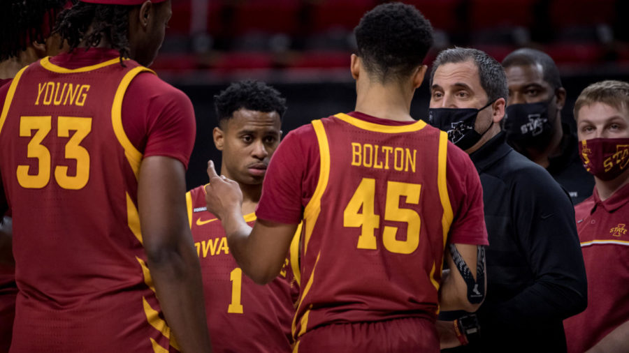 Iowa State Head Coach Steve Prohm talks with Rasir Bolton and other Iowa State players during a timeout Feb. 2 at Hilton Coliseum.