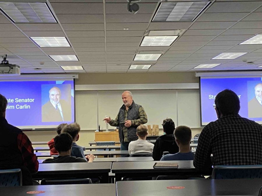 Sen. Jim Carlin spoke during a Young Americans for Freedom meeting Tuesday at Carver Hall.