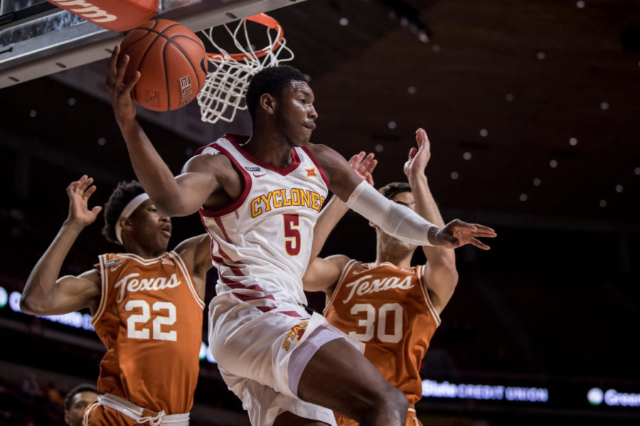 Jalen Coleman-Lands drives the baseline to pass the ball to a teammate against Texas on March 2 in Hilton Coliseum. (Courtesy of Luke Lu/Iowa State Athletics)