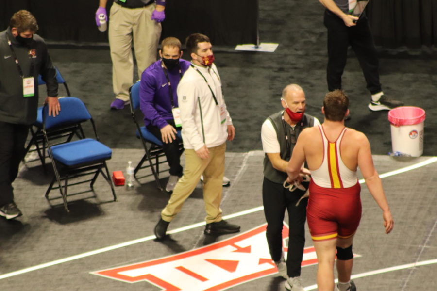 Gannon Gremmel walks off the mat after defeating South Dakota States Blake Wolters in the quarterfinals at Heavyweight in the 2021 Big 12 Championships.