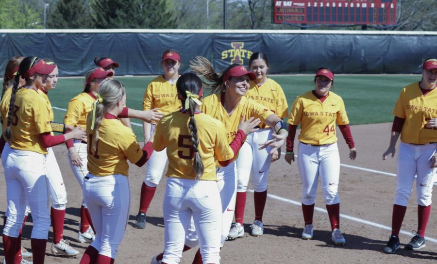 Iowa State players enter the field of the Iowa State vs Kansas game on May 3. The Cyclones defeated the Jayhawks 3-2.