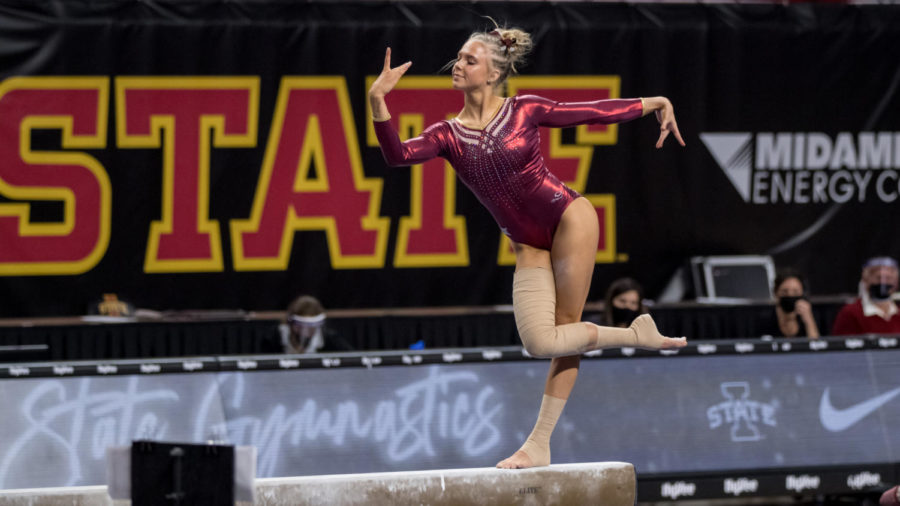 Kelsey Boychuk does a routine on the uneven bars in Iowa State gymnastics meet against Northern Illinois on March 12. (Photo courtesy of Luke Lu/Iowa State Athletics)
