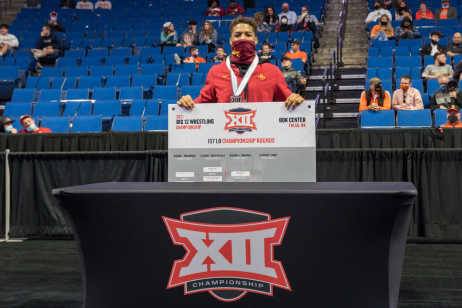 David Carr celebrates after winning his second consecutive Big 12 individual title at 157 pounds March 7 in the 2021 Big 12 Wrestling Championships. 