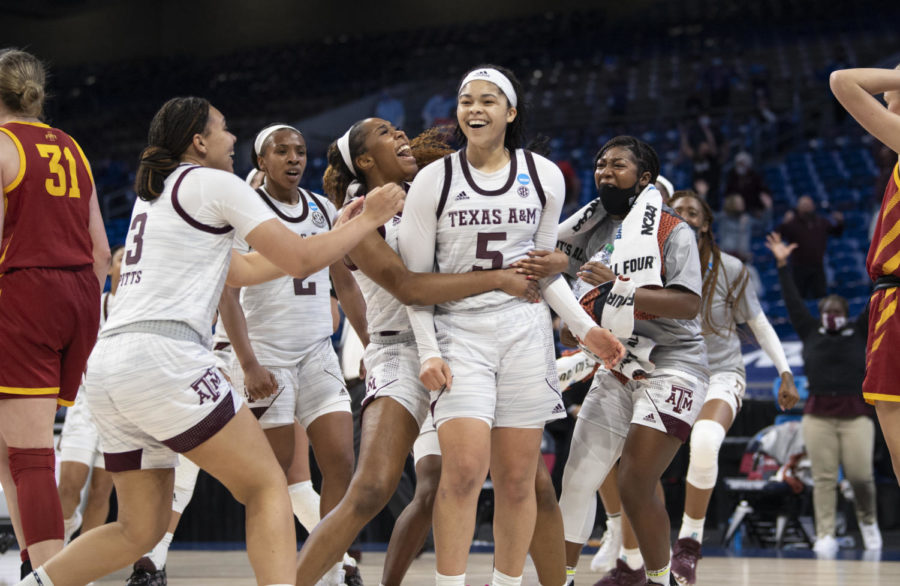 Texas A&M guard Jordan Nixon celebrates with her teammates after her game-winning shot against Iowa State University during the second round of the 2021 NCAA Division I Women’s Basketball Tournament on Wednesday. 