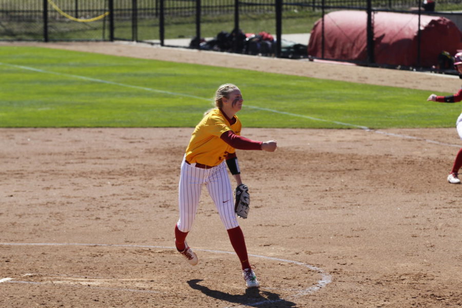 Iowa State utility player Ellie Spelhaug pitches against the University of Oklahoma in the last game of a three-game series on March 28.