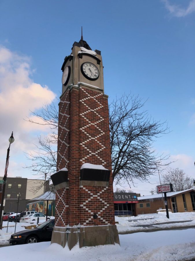 The+Campustown+clock+tower+Feb.+20%2C+2019%2C+dusted+with+snow.