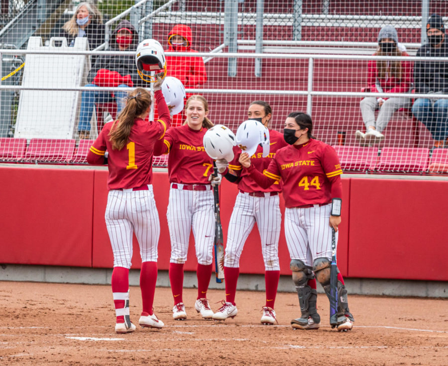 The Cyclones celebrate a home run from Carli Spelhaug against Texas on April 10.