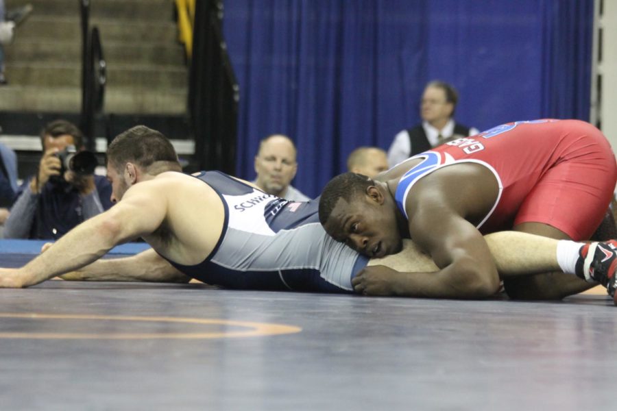 Kyven Gadson gets the takedown against Scott Schiller from Minnesota in the second round of the Olympic Trials in Iowa City, Iowa on April 10. 